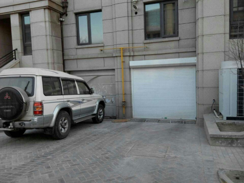 中海央墅:滑板车库门与湘联车库门对比图片